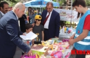 Ülkü Ocakları Gümüşhane'de Karne Hediyesi Olarak Çocuklara Hediye Dağıttı