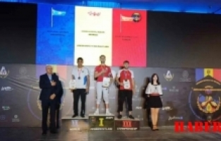 Bilek güreşini bırakmak üzereyken antrenörünün desteğiyle dünya sahnesine çıktı