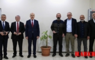 GÜKAV üyelerine plaket takdim edildi